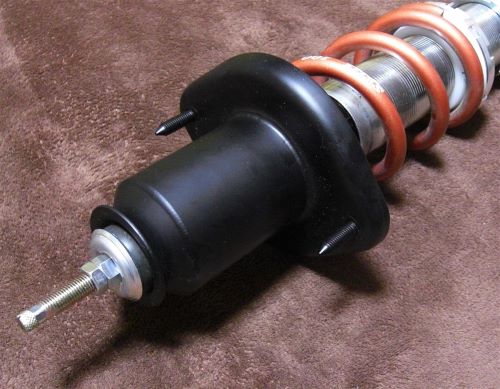 A high-mount upper mount with an extended body-side attachment point